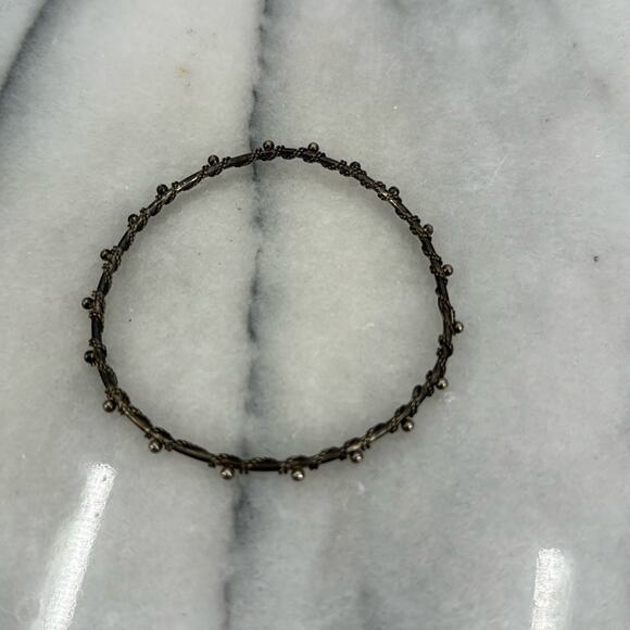 Silver tone wire wrapped bangle bracelet - Picture 1 of 3